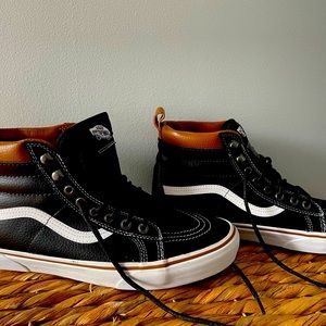 High top black Vans, men’s size 10.